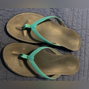 Olukai Teal and Black Flip Flops